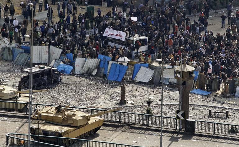 Egyptian army soldiers are positioned between pro- and anti-government demonstrators near Tahrir square, the center of anti-government demonstrations, in Cairo, Thursday, Feb. 3, 2011. (AP)