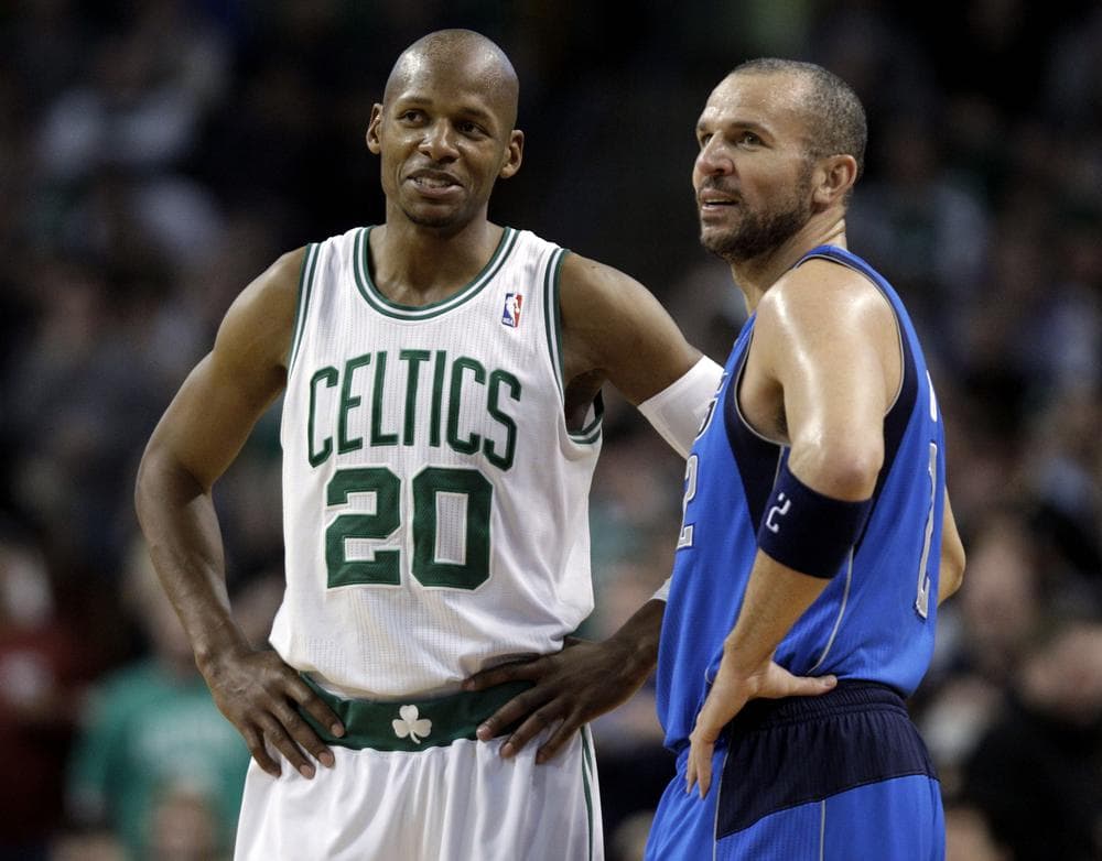 Celtics guard Ray Allen (20) and Dallas Mavericks guard Jason Kidd talk during a lull in the action in the second half, Friday. (AP)