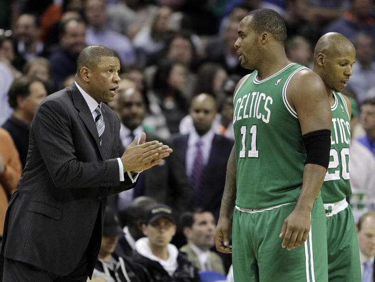 Boston Celtics coach Doc Rivers, left, talks with Glen Davis, center, and Ray Allen, right, in the second half of the Celtics' 94-89 loss to the Charlotte Bobcats in an NBA basketball game in Charlotte, N.C., Monday. (AP)