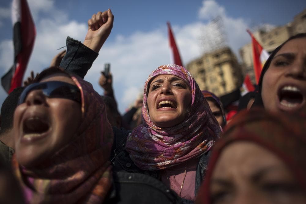 Egyptian anti-Mubarak protesters shout slogans during a demonstration at Tahrir square in Cairo, Egypt, Tuesday, Feb. 8, 2011. (AP)