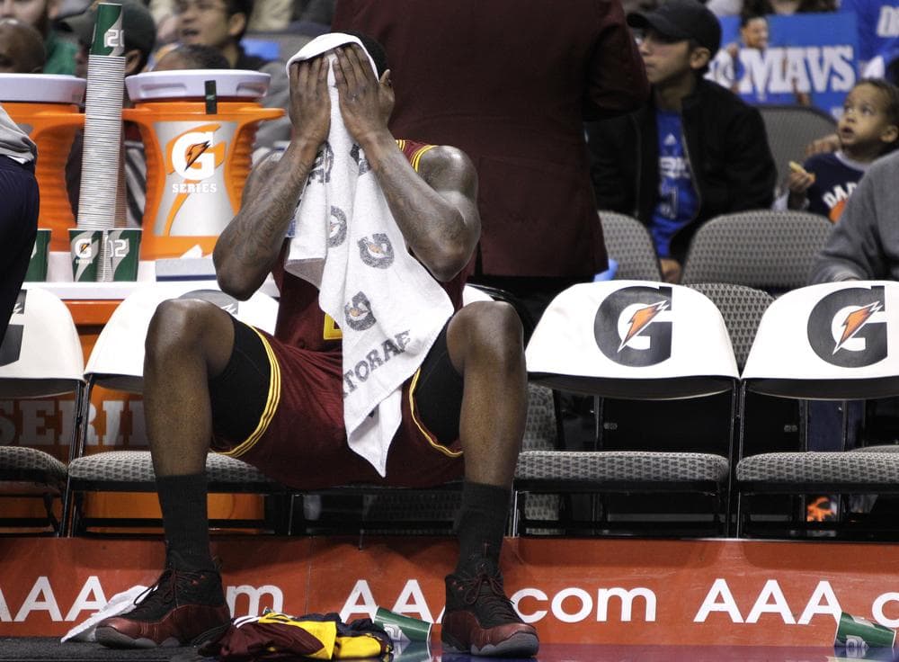 Cleveland Cavaliers power forward J.J. Hickson (21) wipes his face sitting on the bench during the first half of the NBA basketball game against the Dallas Mavericks in Dallas. (AP)