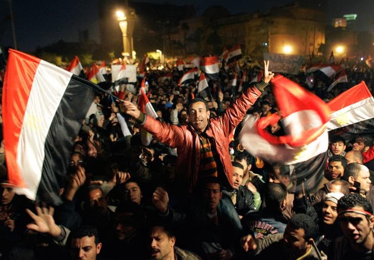 Egyptians celebrate the resignation of President Hosni Mubarak. (AP)