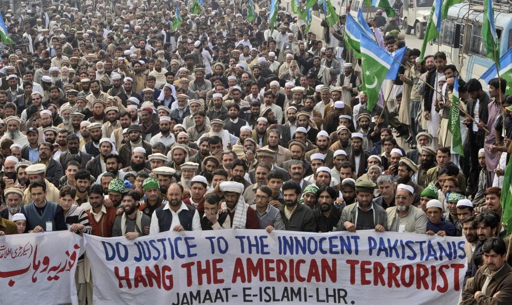 Supporters of Pakistani religious party Jamat-e-Islami attend a rally against Raymond Allen Davis, a U.S. consulate employee suspected in a shooting, in Lahore, Pakistan. (AP)