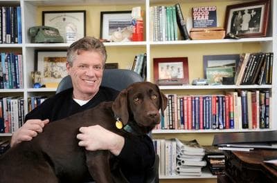 Steve Buckley and his dog Roxy at home in Somerville. (Courtesy David Gordon/Somerville Journal)