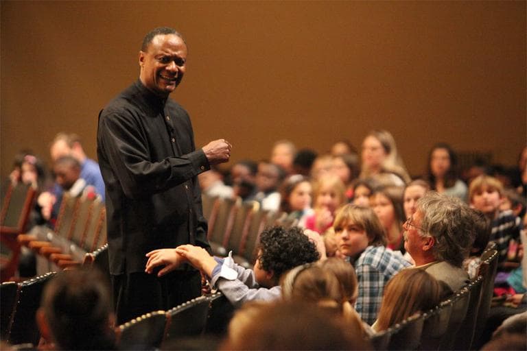 Thomas Wilkins, the BSO's new youth and family concerts conductor, talks to the audience during Wednesday's performance. (Courtesy Hilary Scott/BSO)