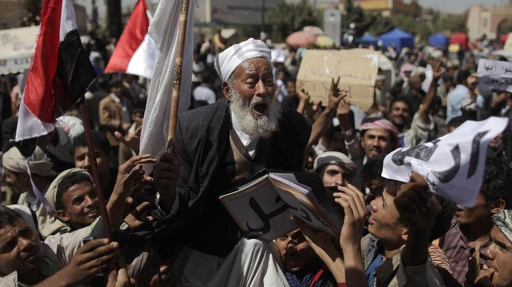 An elderly Yemeni anti-government demonstrator shouts slogans during a demonstration demanding the resignation of President Ali Abdullah Saleh, in Sanaa, Yemen. (AP)