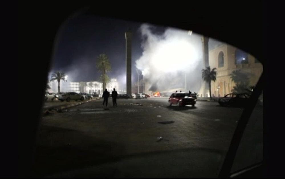 A fire burns in a street in the Libyan capital Tripoli in the early hours Tuesday Feb. 22, 2011 in this image taken from TV. (AP/APTN)