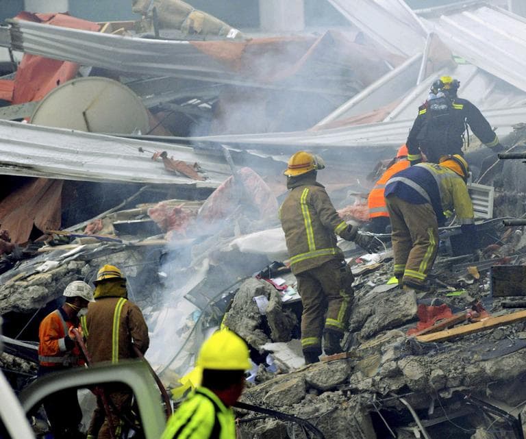 Rescue workers search for victims after an earthquake rocked Christchurch, New Zealand, Tuesday. (AP)