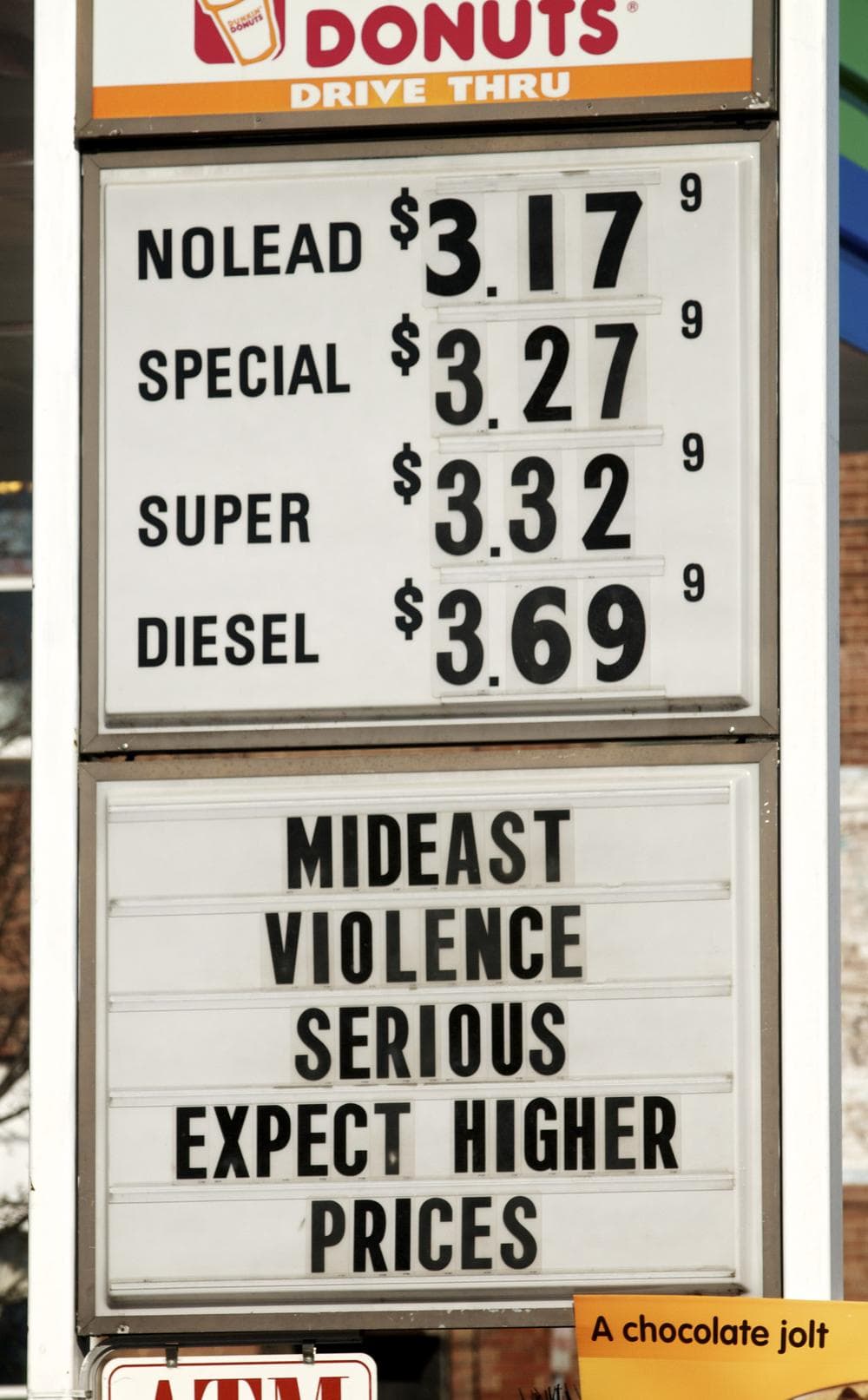 A sign advertises gas and diesel prices at a service station in Easthampton, Mass, Wednesday, Feb. 23, 2011. (AP)