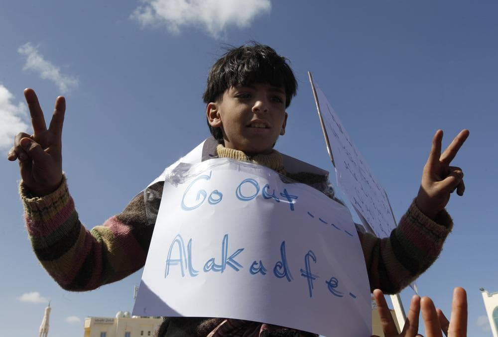 A Libyan boy flashes a V sign as he protests against Libyan Leader Moammar Gadhafi, in Tobruk, Libya, on Wednesday Feb. 23, 2011. (AP)