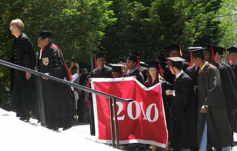 Harvard students march toward the graduation ceremony, led by Harvard President Drew Gilpin Faust, in 2010. (Marissa Babin/Flickr)