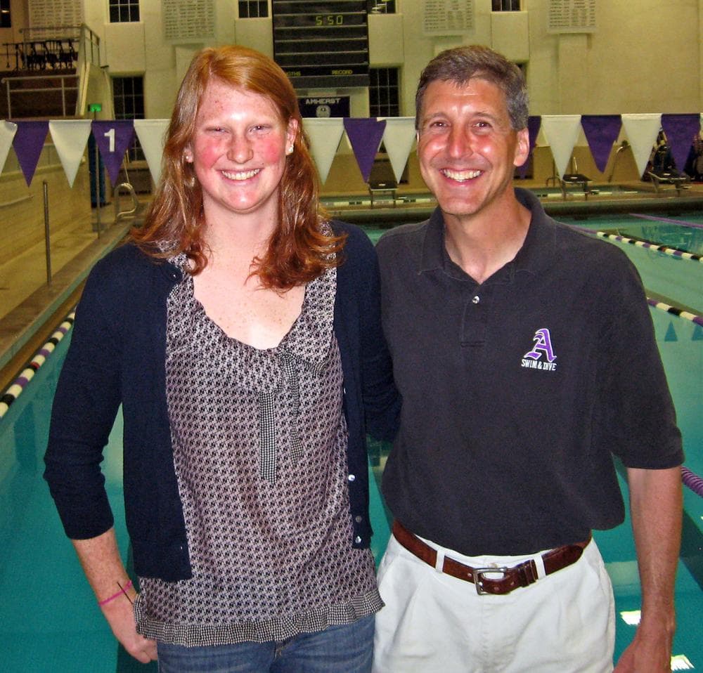Kendra Stern with Amherst College Men&#039;s and Women&#039;s Head Swimming Coach Nick Nichols. (Doug Tribou/WBUR)