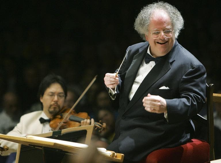 This photo taken July 7, 2006 shows Boston Symphony Orchestra music director James Levine, right, conducting the symphony on its opening night performance at Tanglewood in Lenox., Mass. (AP)