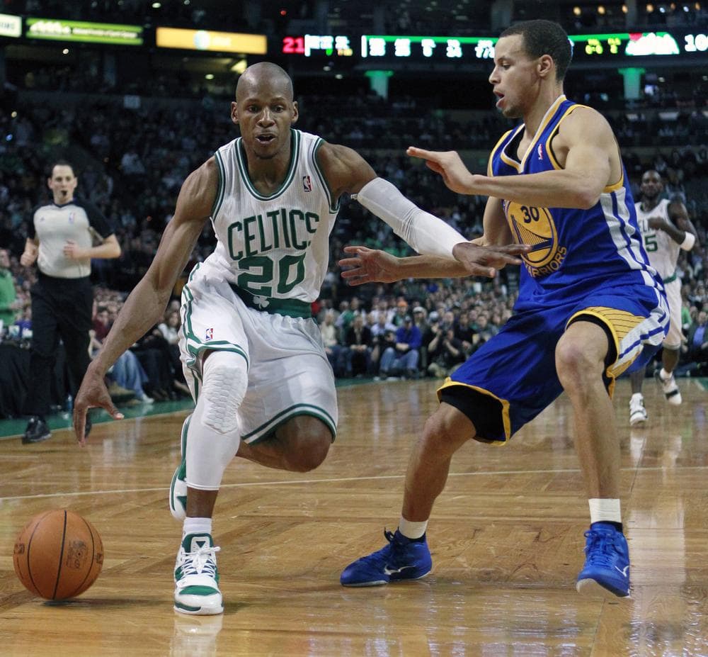 Ray Allen looks to drive past Golden State Warriors' Stephen Curry in the fourth quarter Friday in Boston. (AP)