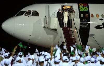 Libyan Abdel Baset al-Megrahi, who found guilty of the 1988 Lockerbie bombing, top  left, is accompanied by Seif al-Islam el- Gadhafi, son of Libyan leader Libyan leader Moammar Gadhafi upon his arrival at airport in Tripoli, Libya, Thursday, Aug. 20, 2009 after Scotland freed the terminally ill Lockerbie bomber on compassionate grounds. (AP)