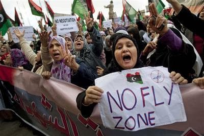 Libyan women protest to demand the resignation of Libyan leader Moammar Gadhafi and for a no-fly zone during a demonstration in Benghazi, eastern Libya. (AP)