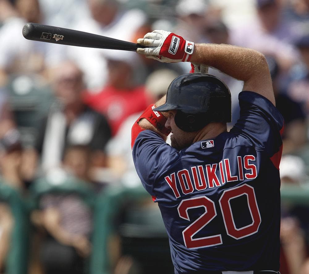 Boston Red Sox third baseman Kevin Youkilis (20) plays in a spring training baseball game against the Atlanta Braves on Wednesday in Kissimmee, Fla. (AP)