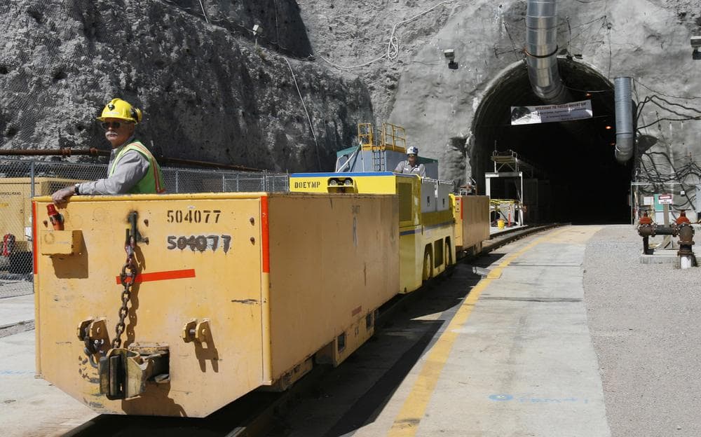 Pete Vavricka conducts an underground train from the entrance of Yucca Mountain in Nevada in 2006. (AP)