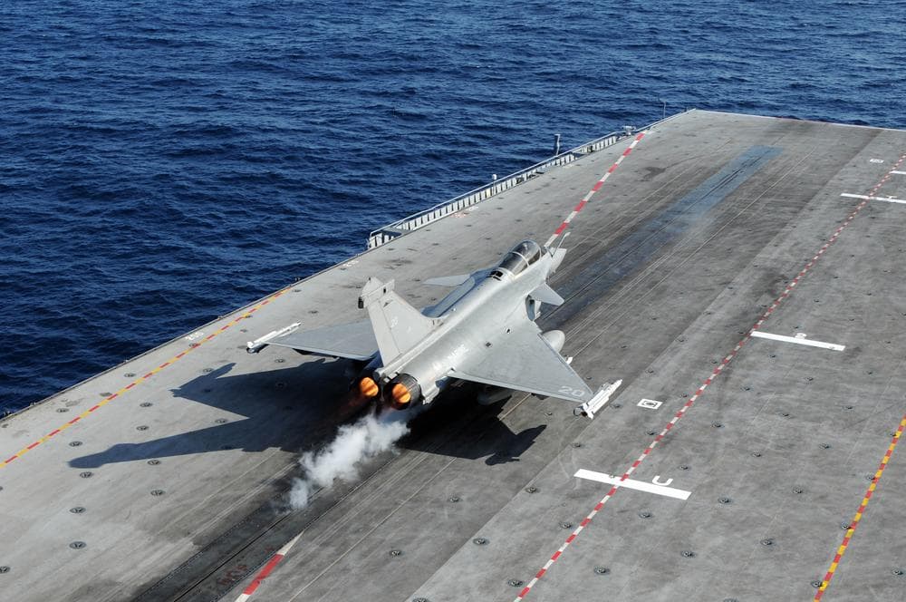 A French Navy Rafale jet fighter takes off the flight deck of Charles de Gaulle aircraft carrier in the Mediterranean sea as part of the Operation Odyssey Dawn. (AP/French Army) 