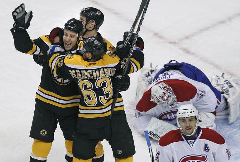 Boston Bruins center Gregory Campbell, left, celebrates his goal with teammates Shawn Thornton, middle, and Brad Marchand as Montreal Canadiens goalie Carey Price and center Tomas Plekanec react Thursday. (AP)