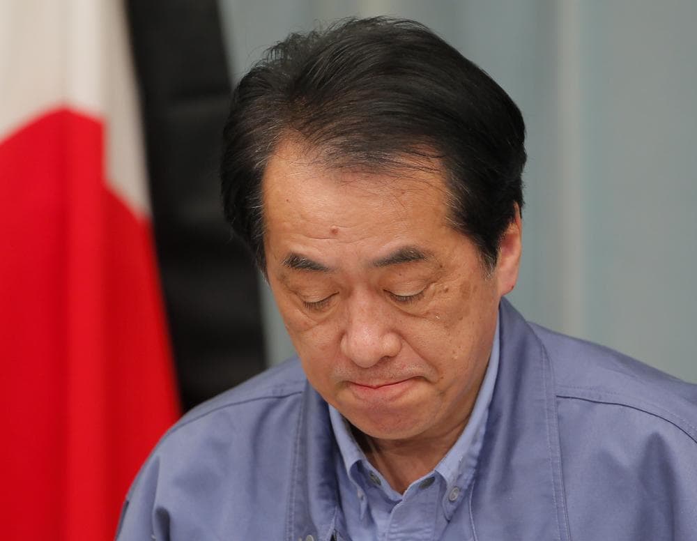 Japanese Prime Minister Naoto Kan speaks during a news conference at his official residence in Tokyo Friday. (AP)