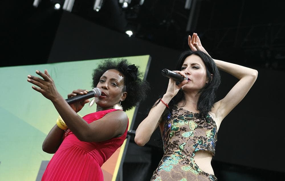 Xiomara Laugart, left, and CuCu Diamantes of Yerba Buena perform in New York. The artists will attend the upcoming Sí Cuba festival in New York City. (AP)