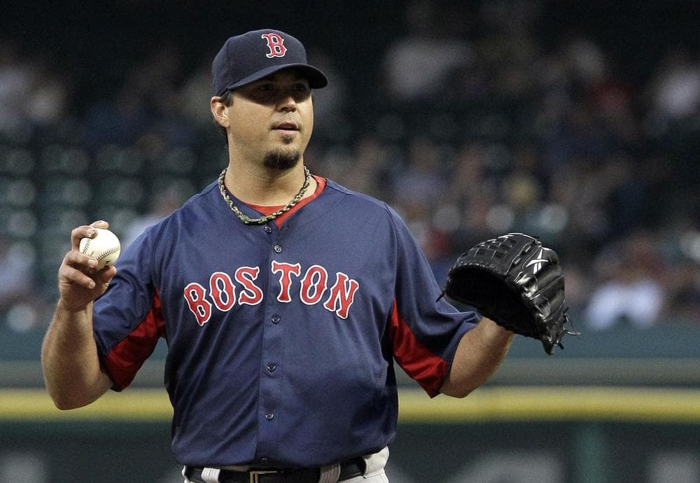 Boston Red Sox pitcher Josh Beckett waits for a batter to get ready during the first inning of the game against the Houston Astros Wednesday in Houston. Beckett pitched five shutout innings, giving up only one hit. (AP)