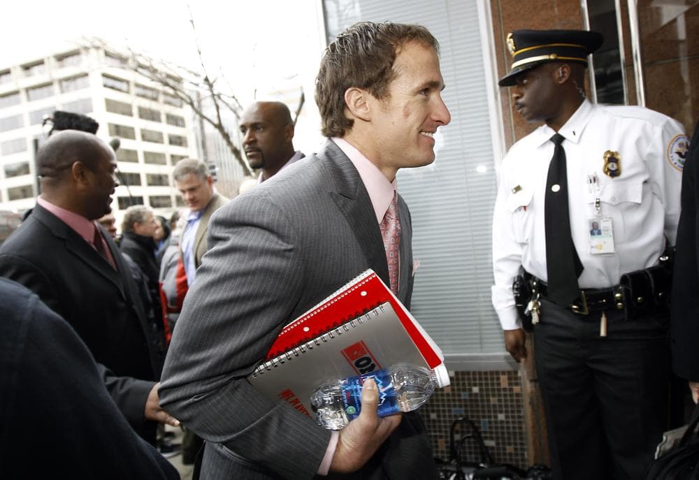 New Orleans Saints quarterback Drew Brees arrives for negotiations with the NFL involving a federal mediator. (AP)