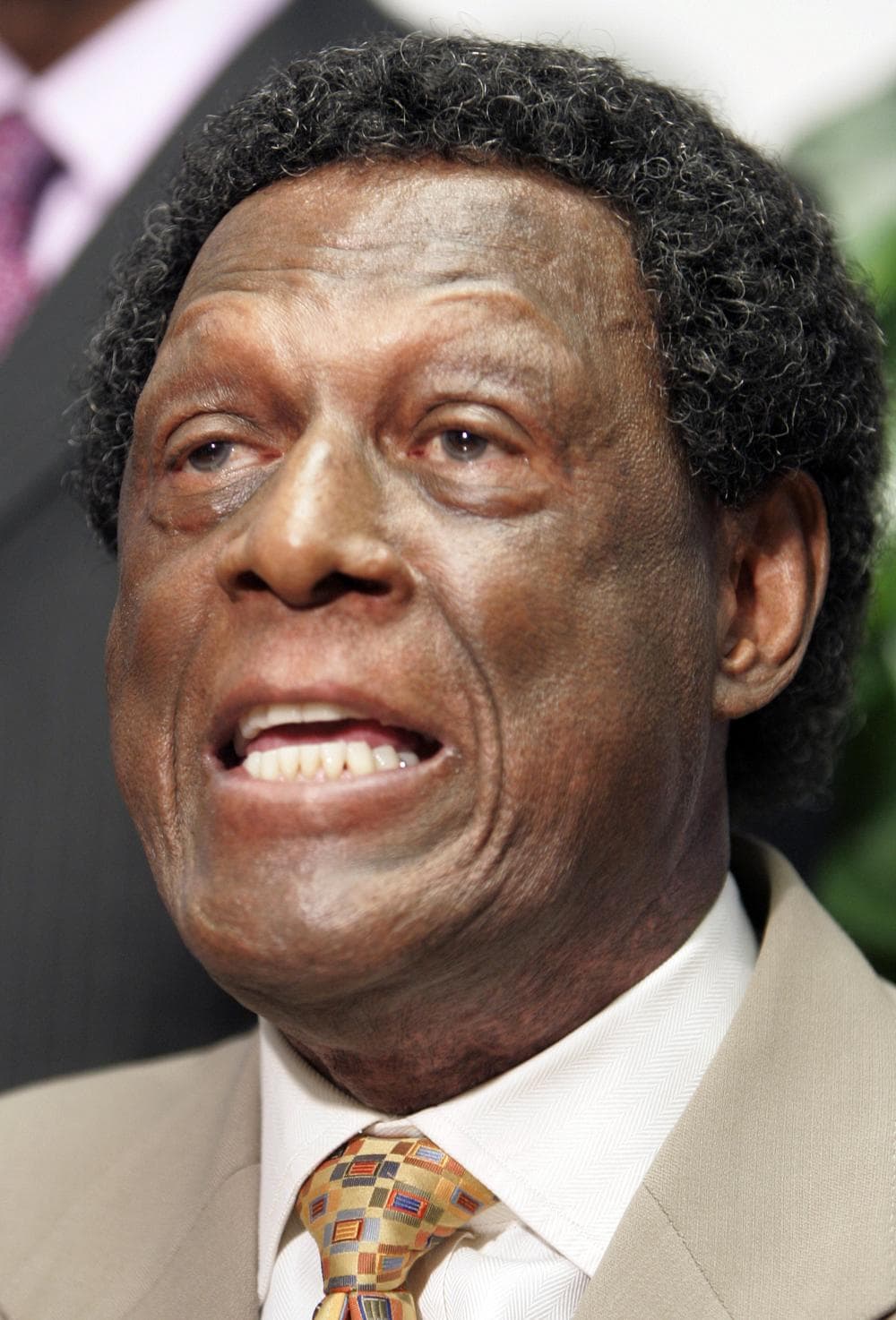 NBA Hall of Famer and former Los Angeles Clippers executive Elgin Baylor is suing the team saying he was wrongfully terminated in 2008 &quot;on account of his age and his race&quot; and that he was grossly underpaid. (AP)