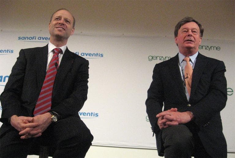 Sanofi-Aventis CEO Chris Viehbacher, left, and Genzyme CEO Henri Termeer at a news conference Wednesday (Curt Nickisch/WBUR)