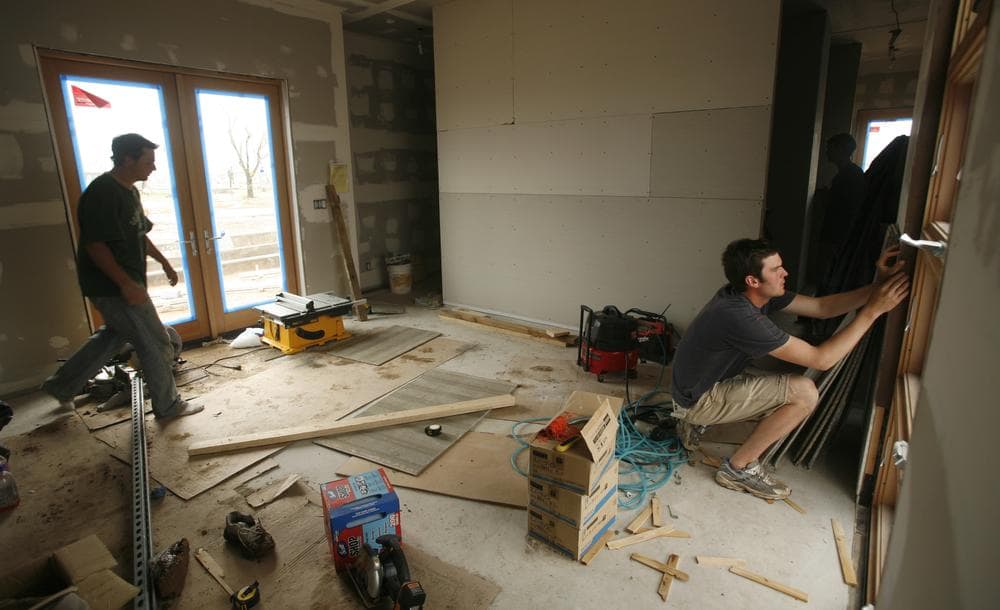 Kansas University graduate students work on a new art center in Greensburg, Kan. in 2008. (AP)