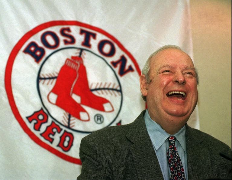Lou Gorman, Boston Red Sox executive vice president of baseball operations, smiles as he announces his retirement during a 1996 news conference. (AP)