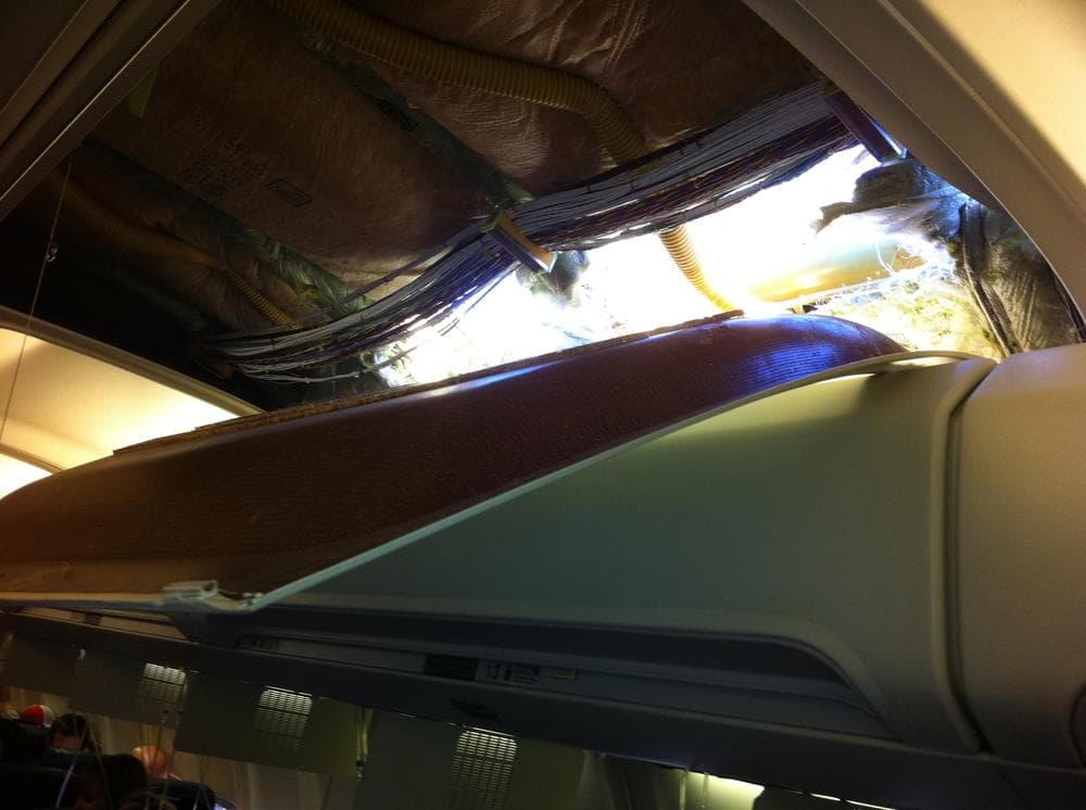 This photo, provided by passenger Christine Ziegler, shows an apparent hole in the cabin on a Southwest Airlines aircraft Friday in Yuma, Ariz. (AP/Christine Ziegler) 