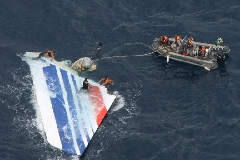 In this June 2009 file photo released by Brazil&#039;s Air Force, Brazil&#039;s Navy sailors recover debris from the missing Air France Flight 447 in the Atlantic Ocean. (AP)