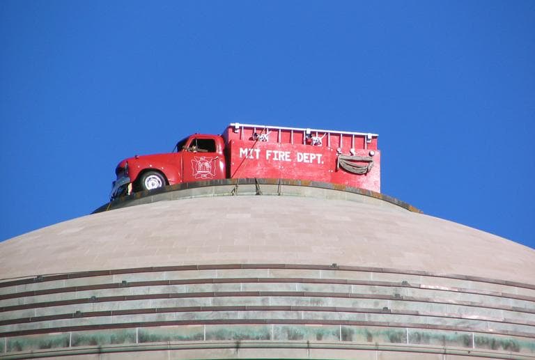 A famous MIT hack that saw a fire truck perched on the roof of the MIT dome. (François @ Edito.qc.ca/Flickr)