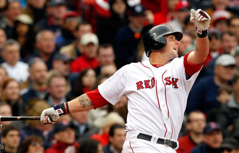 Boston Red Sox&#039;s Jarrod Saltalamacchia hits a RBI double, breaking a 6-6 tie against the New York Yankees during the opener at Fenway Park in Boston Friday. (AP)