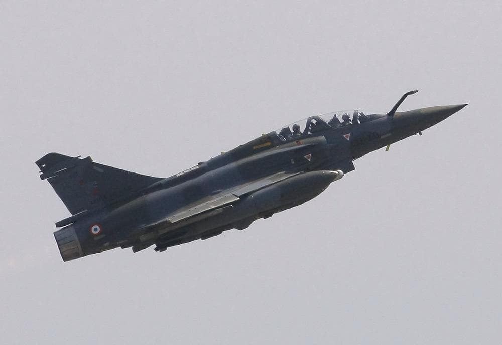 A French jet fighter takes off for a mission to Libya at Solenzara 126 Air Base, on Corsica Island. (AP)