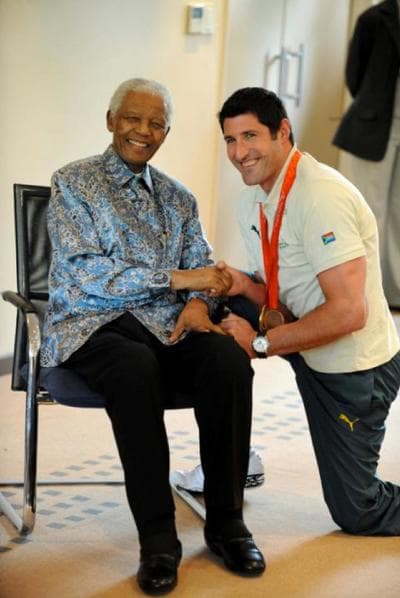 Ernst Van Dyk poses with former South African President Nelson Mandela.  (Courtesy Photo)