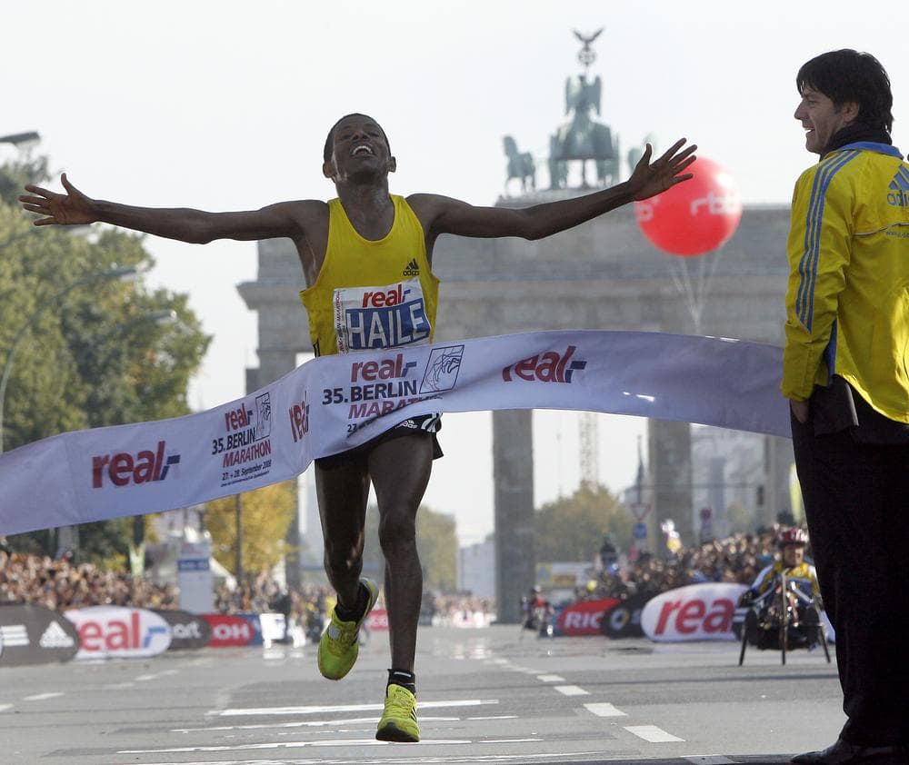 Ethiopia's Haile Gebrselassie sets the world record at the 2008 Berlin marathon with a time of 2:03:59. (AP)