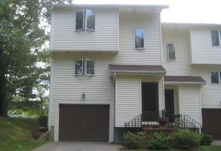 This listing photo shows a townhouse at 35 Diamond St., which is attached to the 31 Diamond St. townhouse in Walpole.