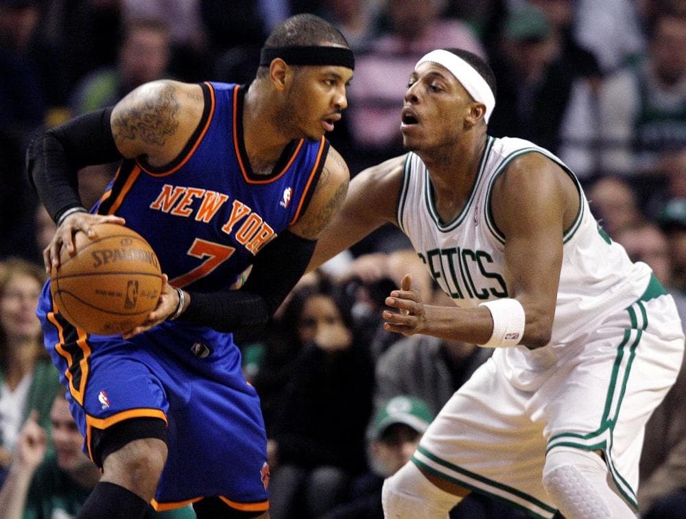Celtics captain Paul Pierce defends against the Knicks' Carmelo Anthony. (AP)