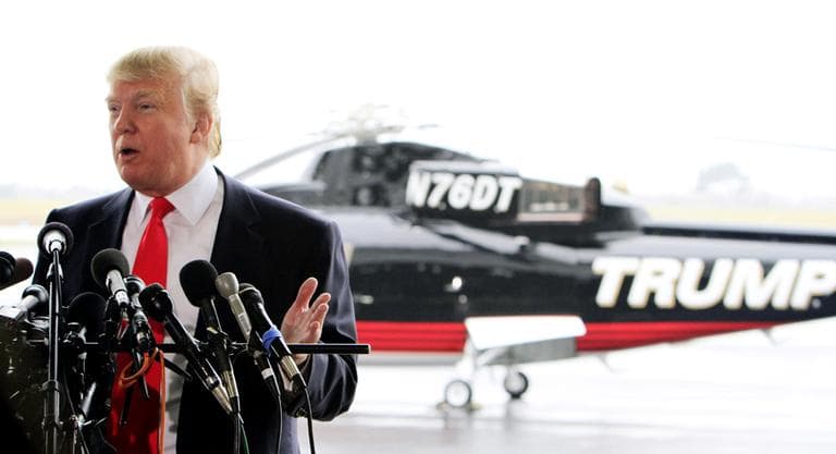 Donald Trump, a possible 2012 presidential candidate talks with reporters  at the Pease International Tradeport in Portsmouth, N.H., Wednesday. (AP)