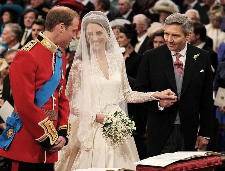 Prince William greets Kate Middleton as she arrives at the alter with her father prior to their marriage. (AP)