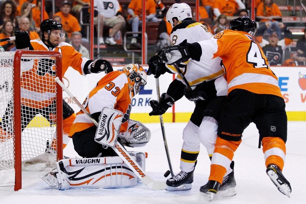 The Bruins' Nathan Horton scores a goal against Philadelphia Flyers' Brian Boucher during Game 1 of the Eastern Conference semifinal in Philadelphia. (AP)