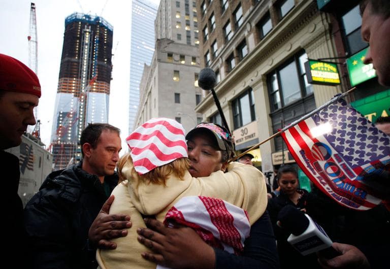 Dionne Layne, facing the camera, hugs Mary Power at Ground Zero in New York City Monday as they react to Osama bin Laden&#039;s death. (AP)