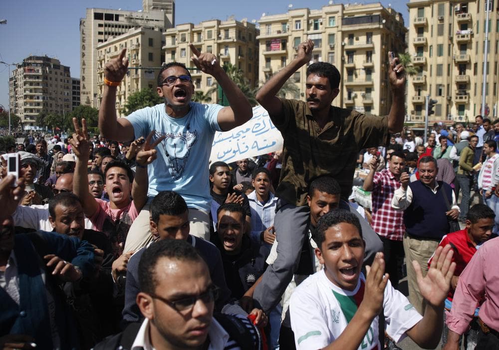 Egyptians shout anti- Mubarak slogans during their protest at Tahrir Square in Cairo, Egypt, April 10, 2011. Former Egyptian President Hosni Mubarak is denying that he abused his authority to amass wealth and property in his first speech since his ouster. Arabic reads &quot;we need our money from Mubarak.&quot; (AP)