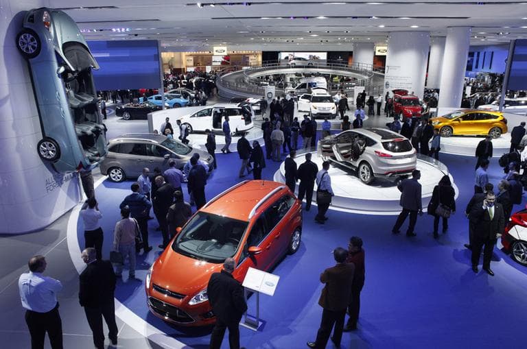 Auto industry professionals view the Ford exhibit at the North American International Auto Show in Detroit in January. (AP)