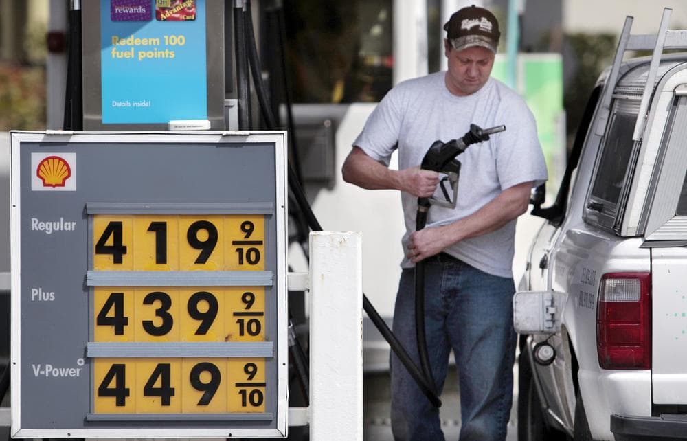 Ryan Riemath fills his tank at a Shell gas station Tuesday, April 26, 2011, in the Seattle suburb of Bellevue, Wash. At $4.199 a gallon, the price is among the highest in the area. (AP)
