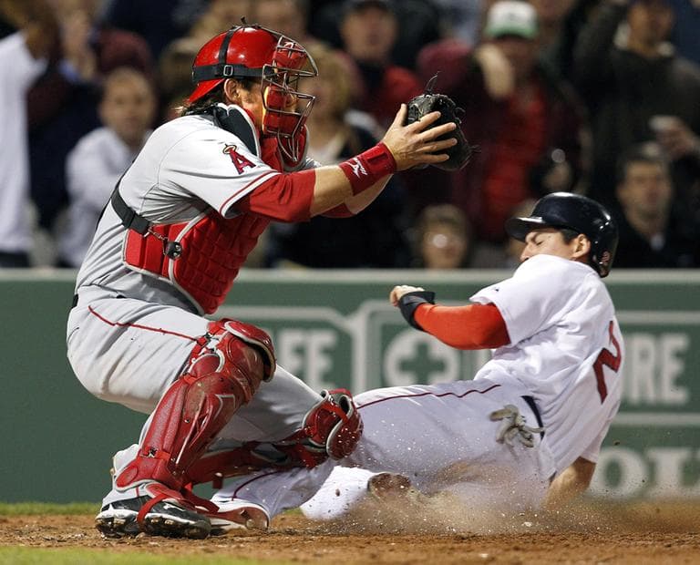 Red Sox&#039;s Jacoby Ellsbury (2) slides safely into home as Los Angeles Angels catcher Jeff Mathis gathers in the throw during the sixth inning of the game, Tuesday. (AP)