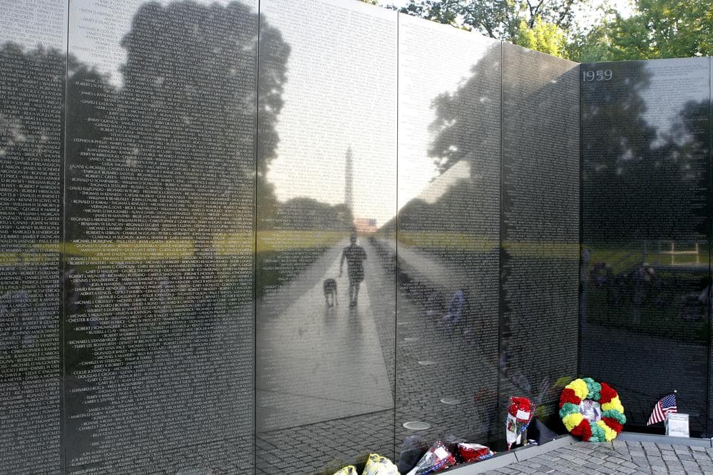 A Pedestrian walks at Vietnam Veterans Memorial in Washington. (AP)